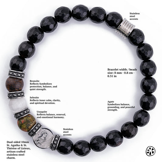 St. Thérèse of Lisieux and St. Agatha of Sicily protection bracelet shown in a detailed infographic highlighting each natural gemstone. Features 8mm black onyx, bronzite, selenite, unakite, and agate beads with tarnish-free stainless steel accents. Includes a dual-sided 10mm saint charm. Gemstone meanings such as balance, clarity, renewal, and protection are labeled around the bracelet on a white background.