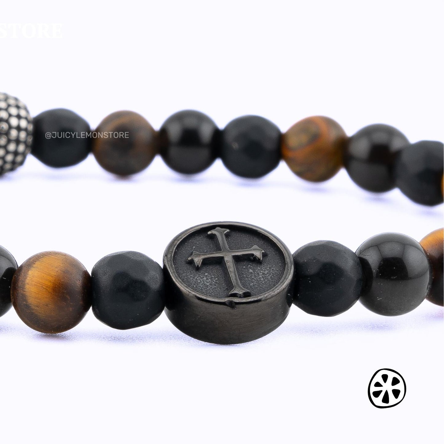 Triple Protection Crucifix bracelet for men and women featuring a black crucifix charm, black matte onyx and tiger eye gemstone beads, and a stainless steel spacer. Handmade in the USA with 6.3mm natural stone beads on a durable stretch cord for everyday wear. Christian religious bracelet symbolizing faith, strength, balance, and devotion. Unisex Catholic jewelry gift for prayer, protection, spiritual style, and meaningful gifting.