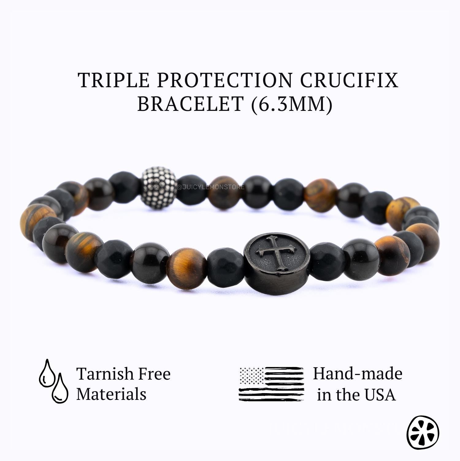 Triple Protection Crucifix bracelet for men and women featuring a black crucifix charm, black matte onyx and tiger eye gemstone beads, and a stainless steel spacer. Handmade in the USA with 6.3mm natural stone beads on a durable stretch cord for everyday wear. Christian religious bracelet symbolizing faith, strength, balance, and devotion. Unisex Catholic jewelry gift for prayer, protection, spiritual style, and meaningful gifting.