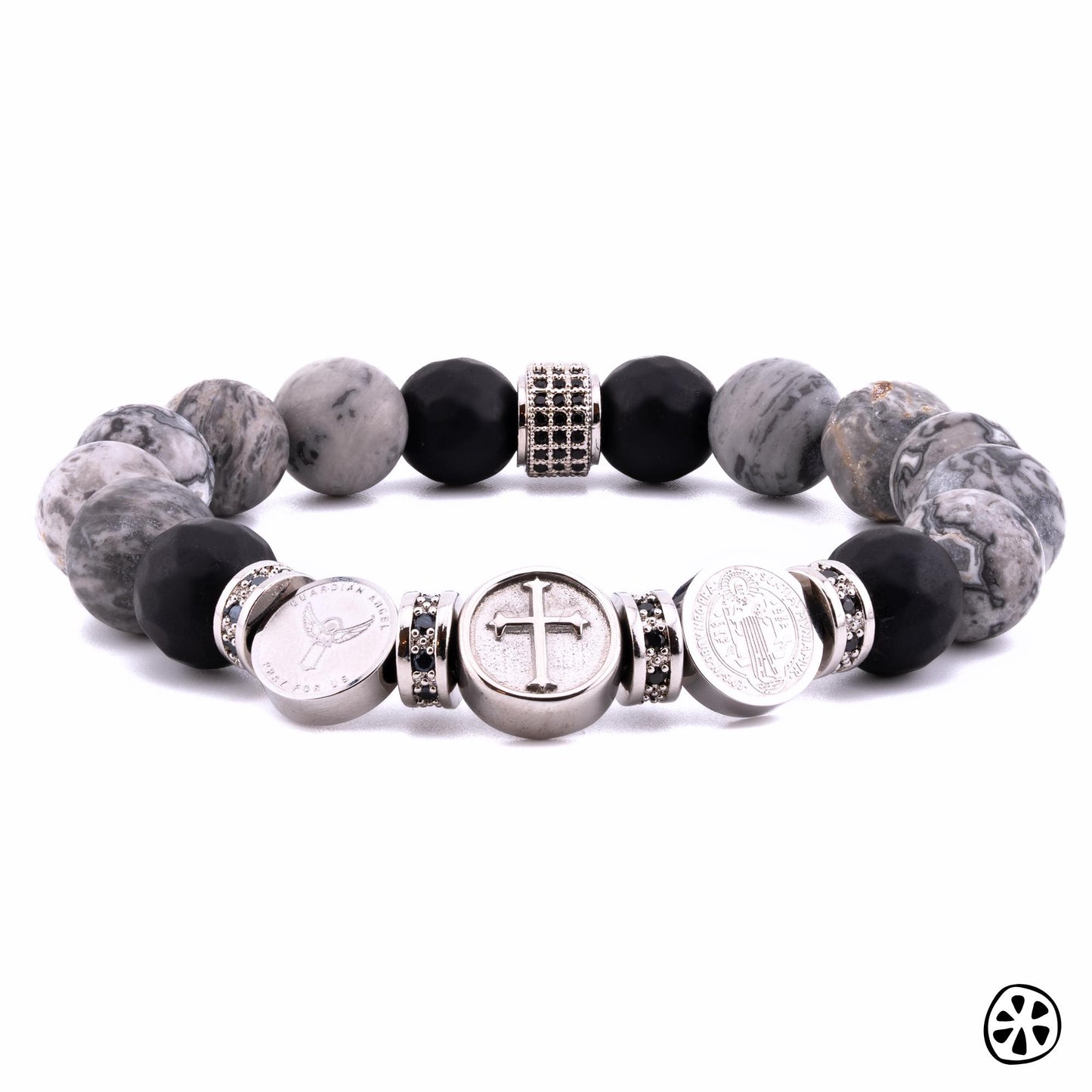 Three Saints Protection Bracelet

This powerful bracelet blends spiritual protection and grounding energy. St. Michael’s sword, Guardian Angel, St. Benedict’s medal, and the Crucifix provide divine protection, strength, and guidance. Map Jasper promotes stability and emotional balance, while Black Onyx absorbs negativity and enhances resilience. Stainless steel and brass add durability and strength, reinforcing its protective energy.