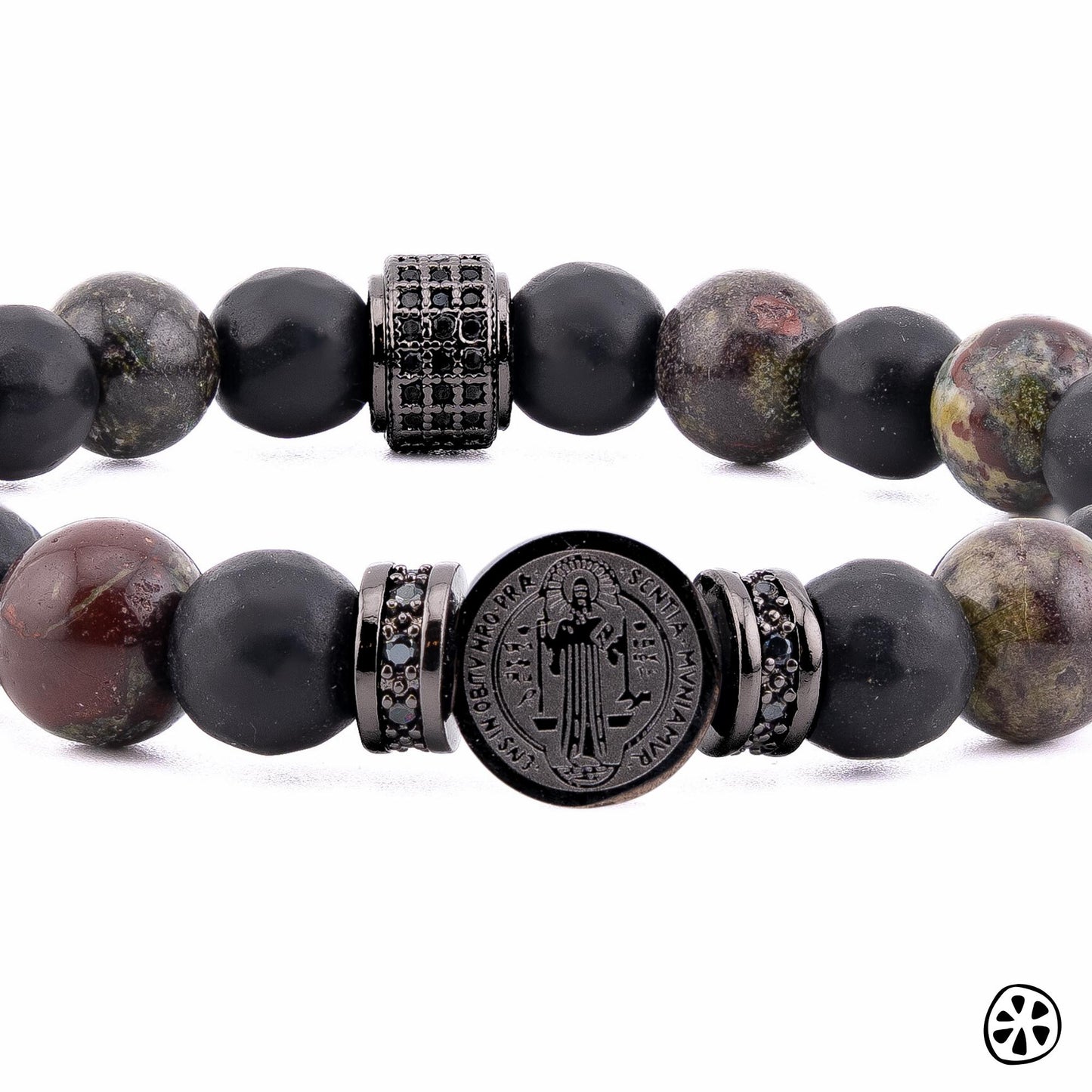 Handcrafted Saint Benedict bracelet featuring a black PVD plated stainless steel medal, symbol of Catholic faith and divine protection. Designed with Dragon Bloodstone beads for courage, Black Onyx for grounding, and CZ brass spacers for sparkle. A spiritual men’s bracelet and unisex Catholic jewelry piece, ideal as a religious birthday gift, Father’s Day gift, or Catholic gift for him. Stylish and meaningful faith bracelet for everyday wear.