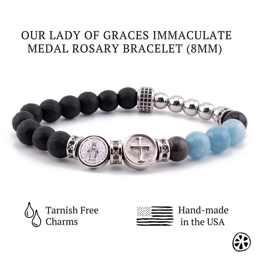 Handmade 15 beads rosary bracelet featuring black matte onyx stones, aqua blue chalcedony, obsidian gemstones, 6mm silver hematite size adjuster beads, and dual-sided stainless steel miraculous medal and cross charms with silver spacers. Unisex Catholic prayer jewelry, stretch fit, designed for daily devotion, faith, and spiritual protection.