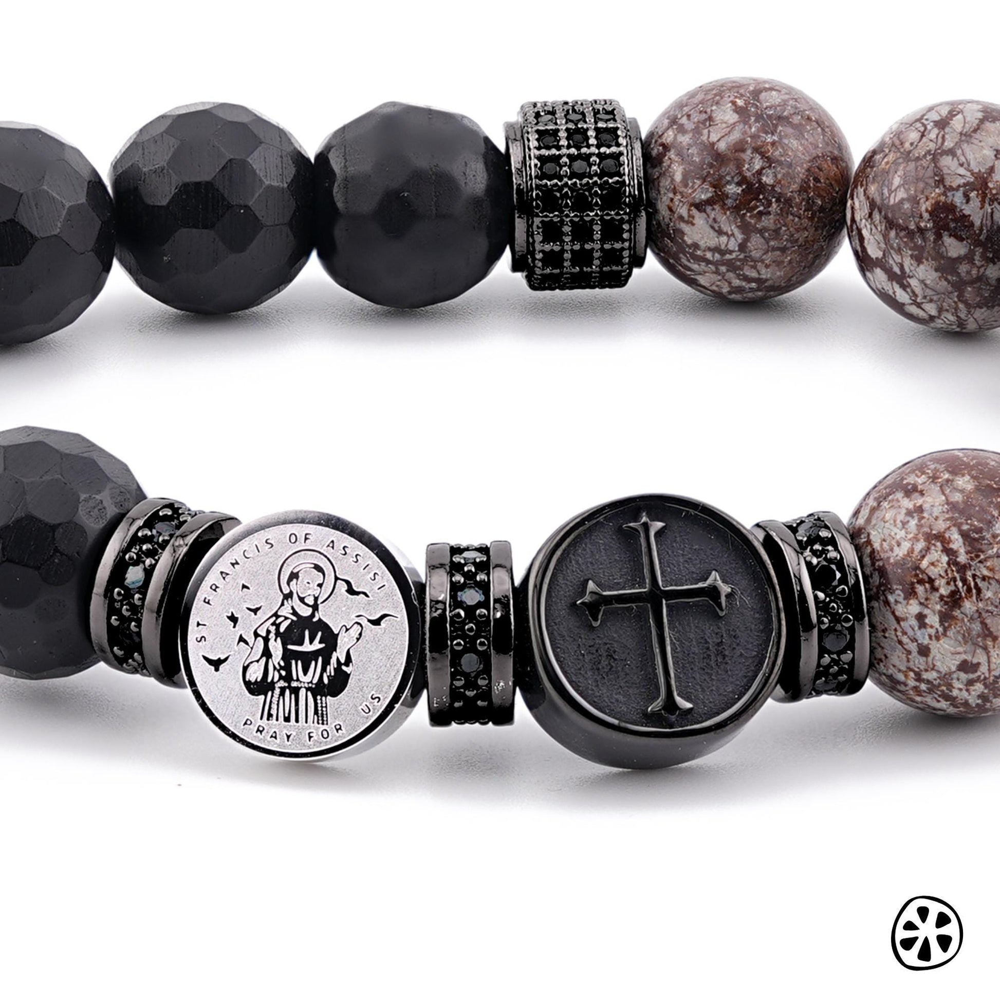 Handmade St. Francis bracelet featuring 10 mm brown snowflake obsidian and faceted black onyx beads. Designed for spiritual protection, faith, and a deep connection to nature. Includes tarnish-free stainless-steel charms with St. Francis and a cross symbol, representing harmony and strength. Handcrafted in the USA with durable stretch cord and premium gemstones for long-lasting wear and meaning.