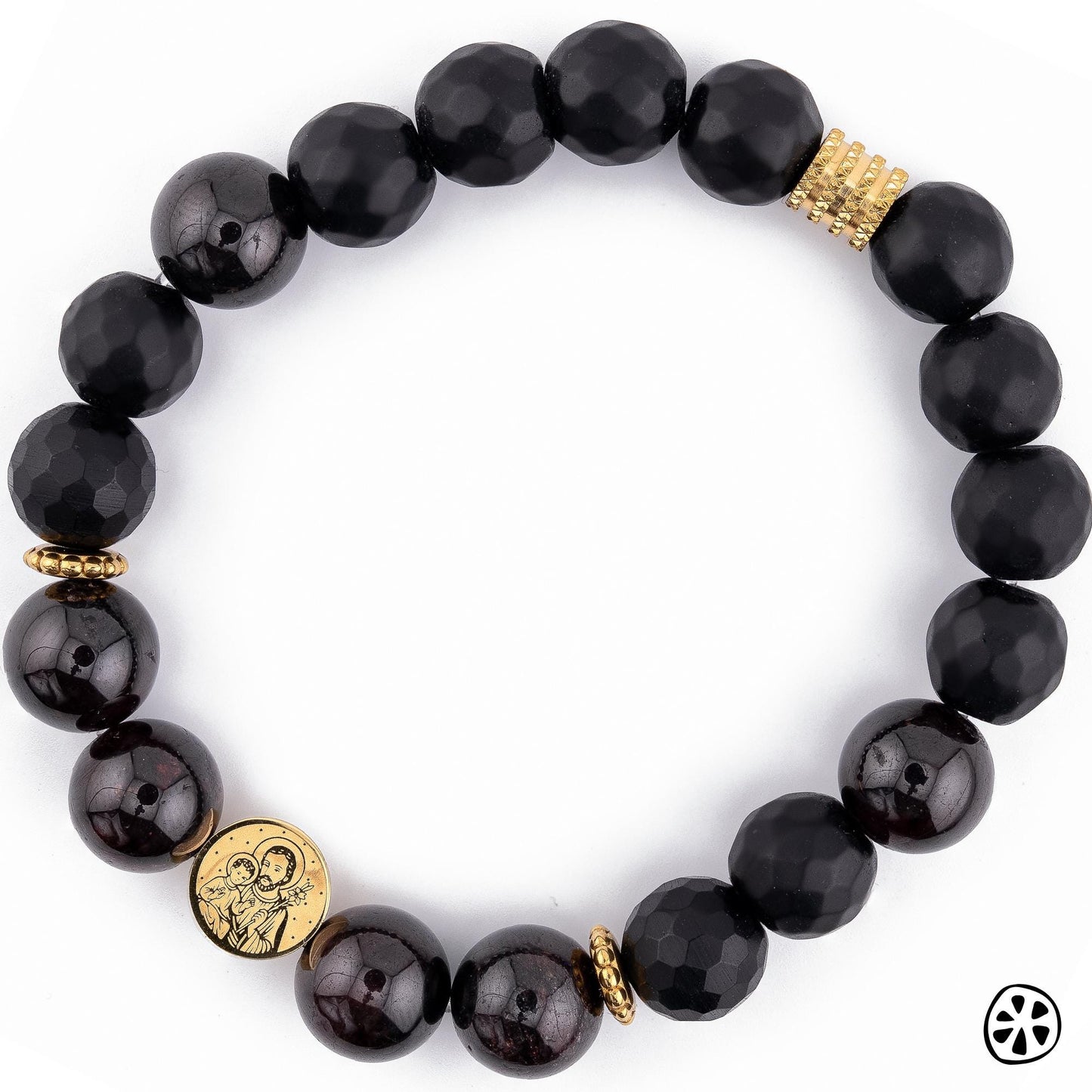 Men’s beaded bracelet detail showing 10mm natural garnet and black matte onyx stones with faceted texture. Features 18k PVD gold-plated stainless steel spacers and a dual-sided 10mm Sacred Family charm. Durable, tarnish-resistant materials designed for long-lasting everyday wear. Handmade men’s Catholic jewelry with premium gemstones and strong elastic cord. JuicyLemonStore