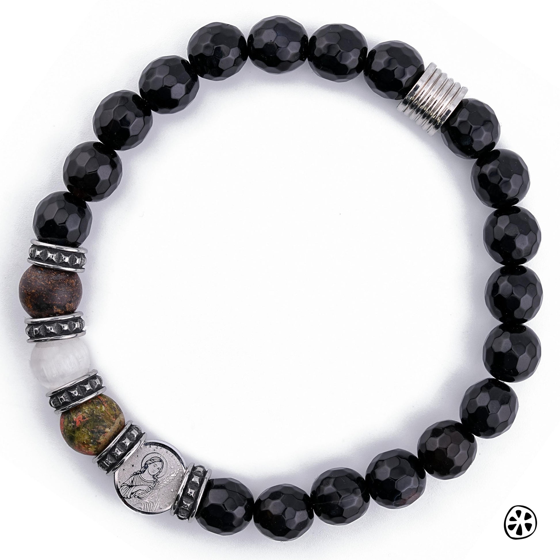 St. Thérèse of Lisieux and St. Agatha of Sicily protection bracelet displayed on a white background. Features 8mm faceted black onyx beads with natural bronzite, selenite, and unakite gemstones near a dual-sided stainless steel saint charm. Includes tarnish-free stainless steel accents and a polished finish. Handmade Catholic bracelet designed for spiritual protection, devotion, and everyday wear.