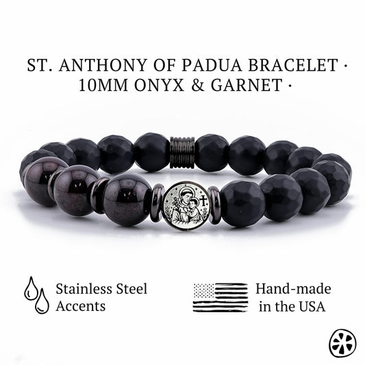 Elegant St. Anthony of Padua bracelet featuring 10mm Black Onyx and Garnet gemstone beads with tarnish-free stainless steel spacers and a double-sided St. Anthony medal. Presented on a clean white background, this handmade Catholic protection bracelet highlights its polished finish, durable materials, and unisex design—perfect for spiritual gifts, faith jewelry, and religious bracelets for men and women.
