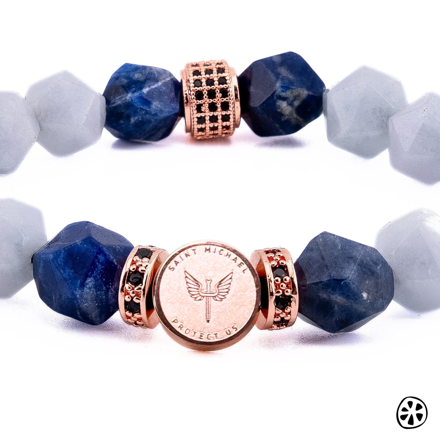 St. Michael protection bracelet with faceted aquamarine and blue sodalite gemstones, featuring a reversible 18K rose gold PVD plated stainless steel medal charm and rose gold CZ brass crystal spacers. Designed as a meaningful Catholic inspired bracelet traditionally associated with peace, clarity, wisdom, guidance, and protection. A thoughtful gift for nurses, caregivers, healthcare workers, teachers, mothers, and loved ones seeking comfort and encouragement.