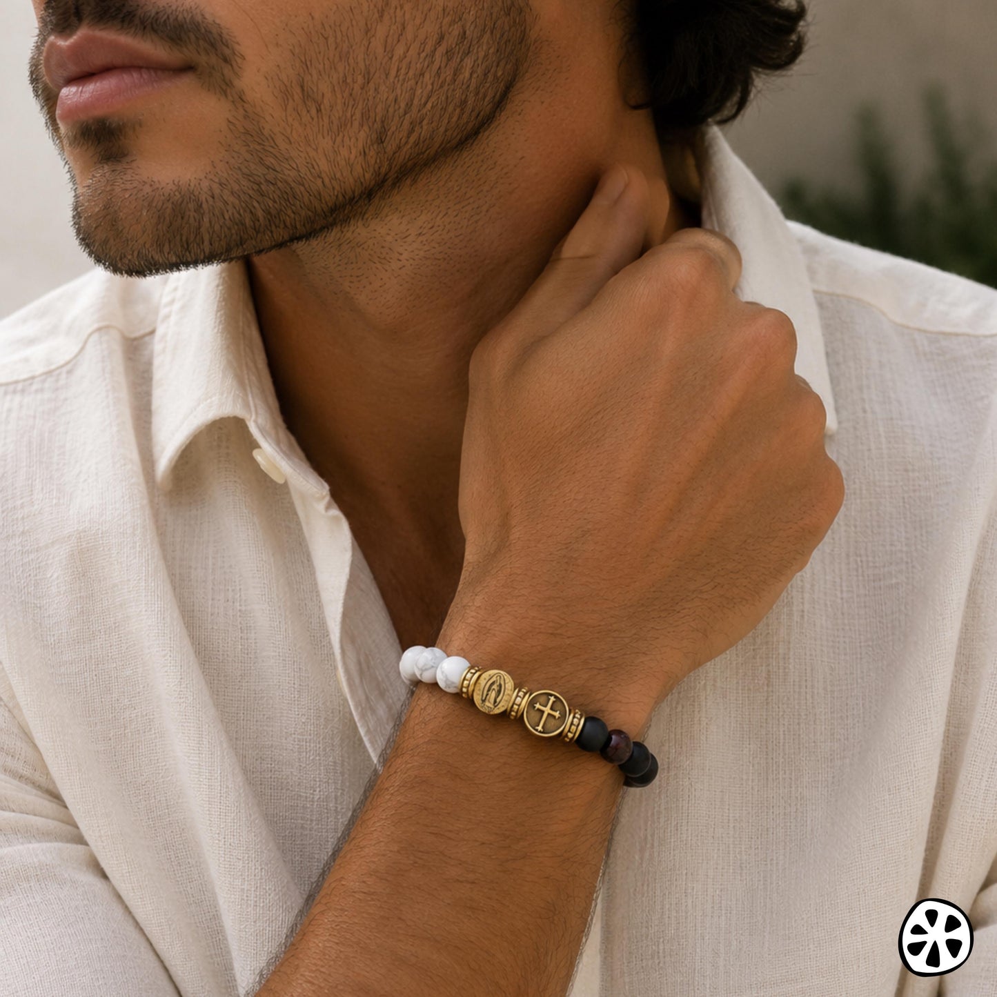 Contemporary Catholic men’s bracelet featuring white howlite, deep red garnet, and matte black onyx gemstone beads with 18K PVD gold plated stainless steel accents. Includes dual sided Our Lady of Guadalupe and cross medals for a bold faith inspired design. Handmade unisex bracelet available in all wrist sizes with custom sizing options. Stylish Christian jewelry gift for men, Father’s Day, confirmation, baptism, husband, boyfriend, dad, or everyday Catholic wear.