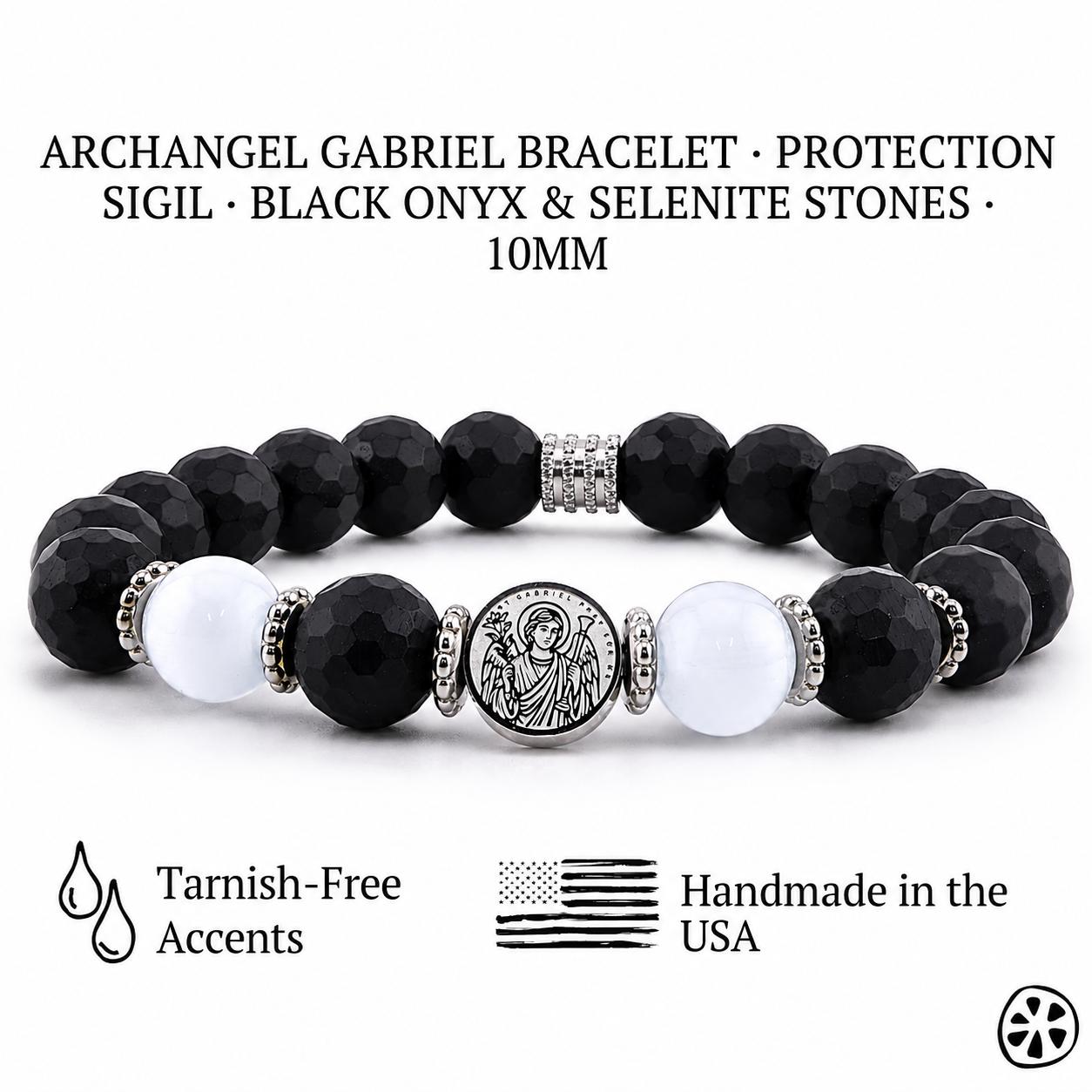 Archangel Gabriel protection bracelet displayed on a white background, featuring 10mm black onyx and bright white selenite beads. Center medal shows an engraved Archangel Gabriel sigil in stainless steel. Tarnish-free silver accents appear between the stones. Two bracelets are stacked together, showing shine, contrast, and handmade craftsmanship, with small icons underneath indicating tarnish-free accents and USA handmade.